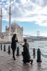 Marriage proposal at Ortaköy Mosque on the Bosphorus in Istanbul, with the bridge in the background