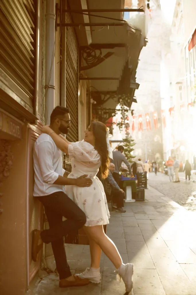 Couple sharing an intimate moment on the quiet Galata street