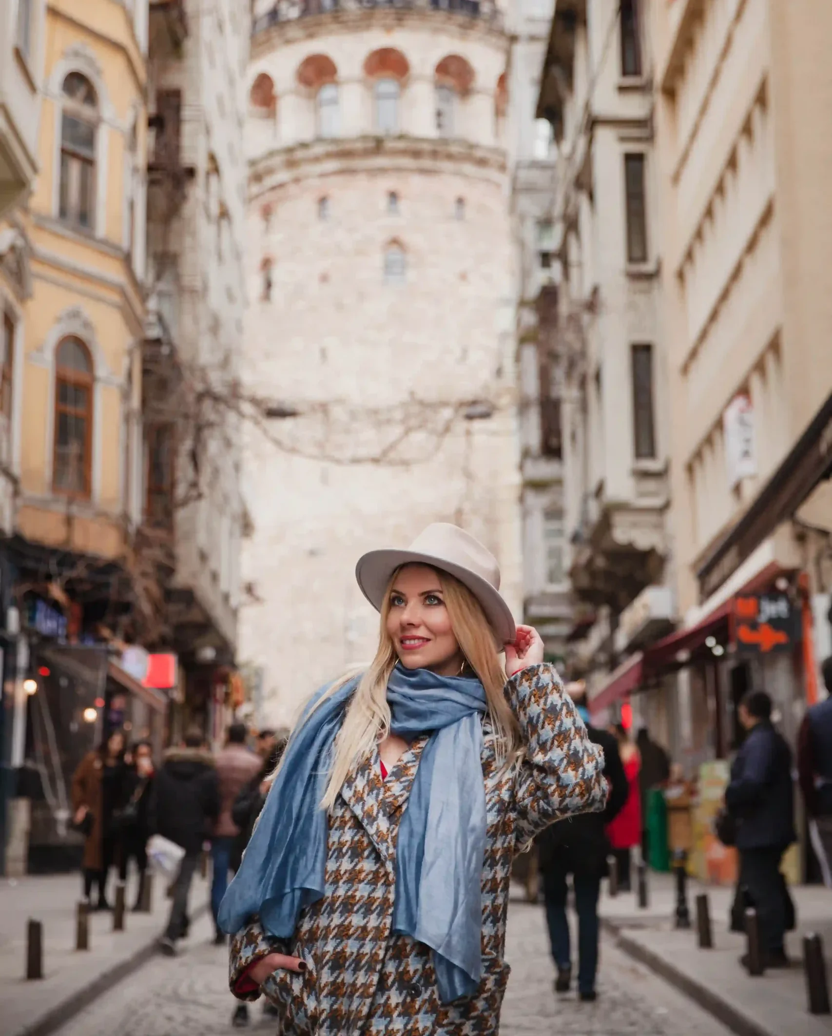 young-smiling-caucasian-tourist-woman-hat-staying-front-galata-tower