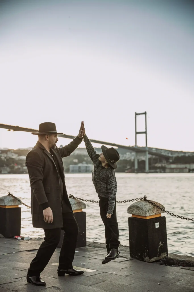 Father and son moment by the Bosphorus – when love lifts you higher than the sea.